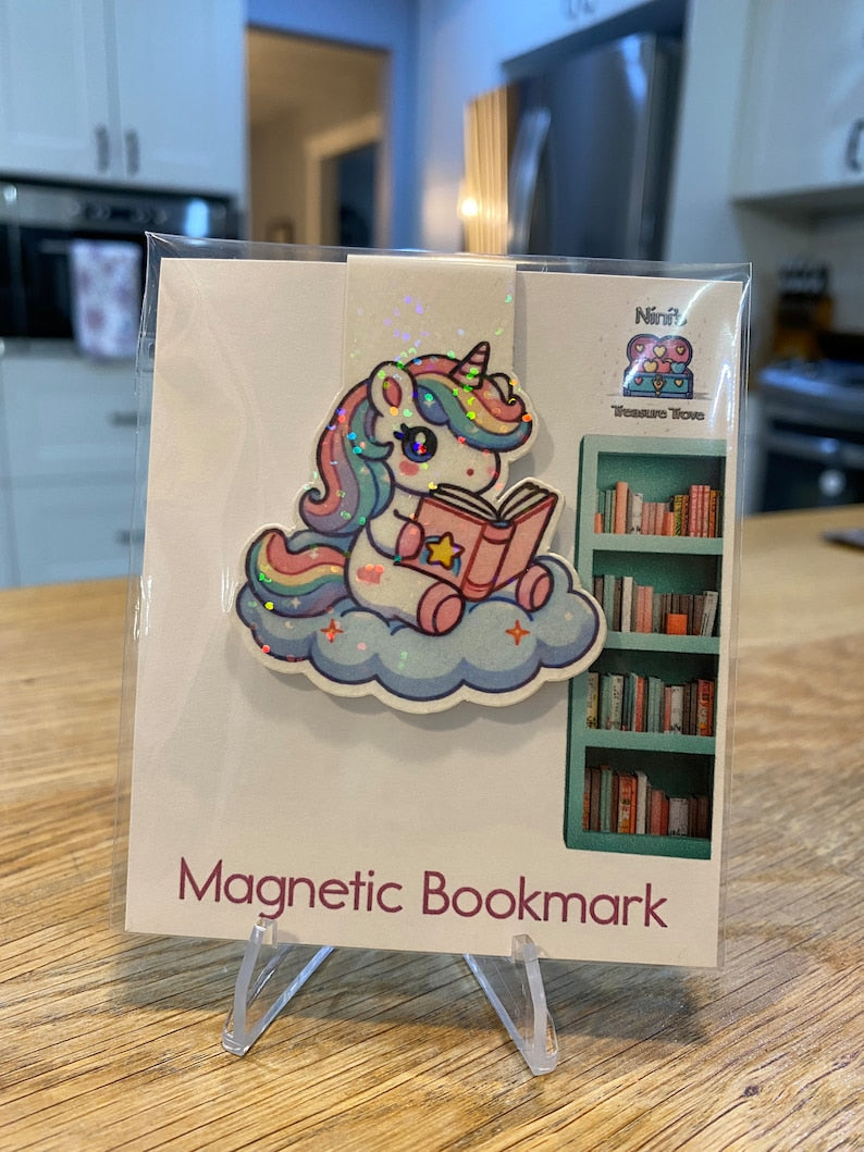 Unicorn bookmark marking a page
