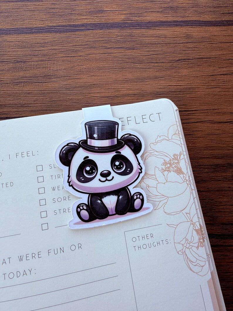Dapper Panda bookmark marking a page