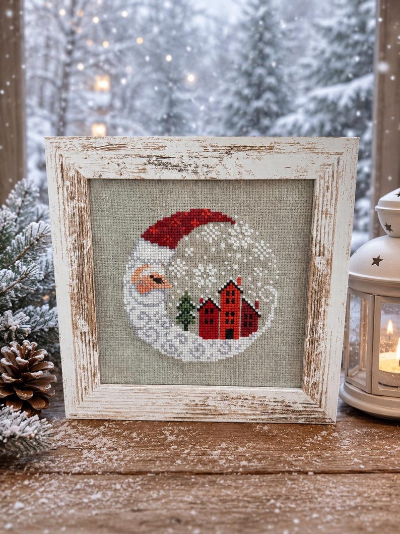 Framed cross-stitch — Santa Christmas Village, distressed white frame