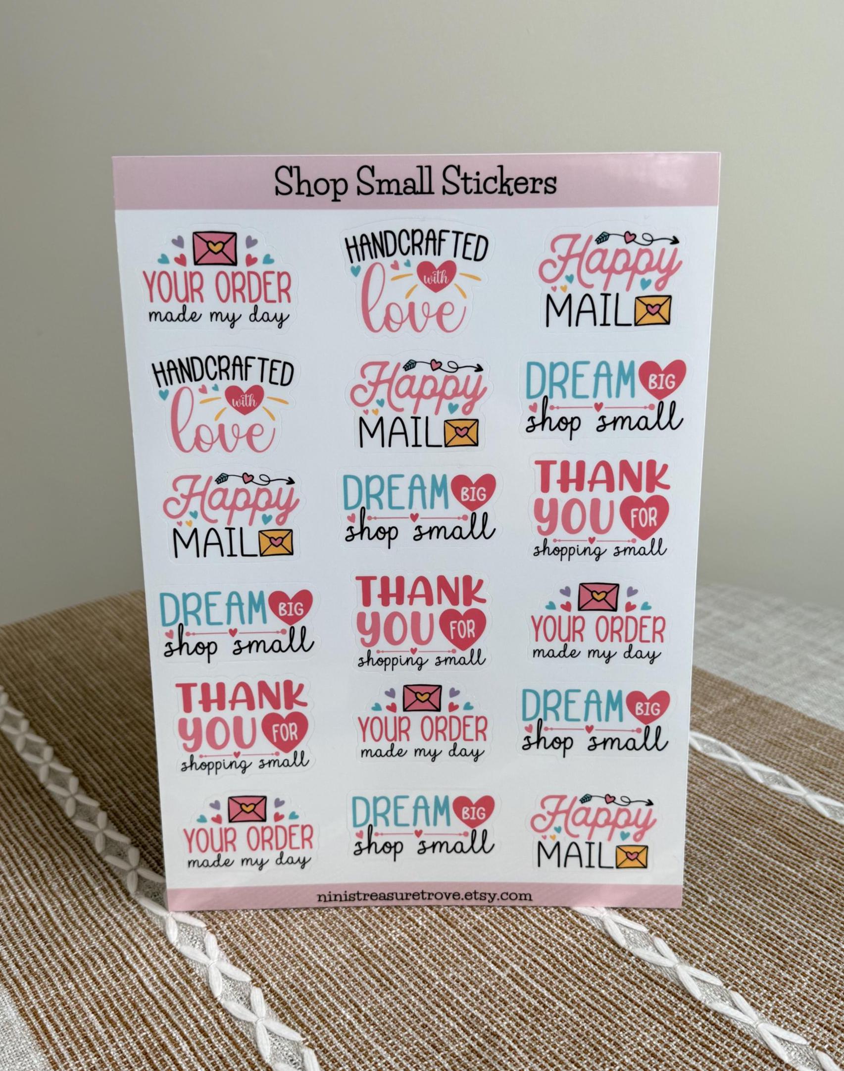 Happy Mail sticker sheet on a woven placemat featuring 'Your Order Made My Day', 'Handcrafted with Love', and 'Thank You for Shopping Small'