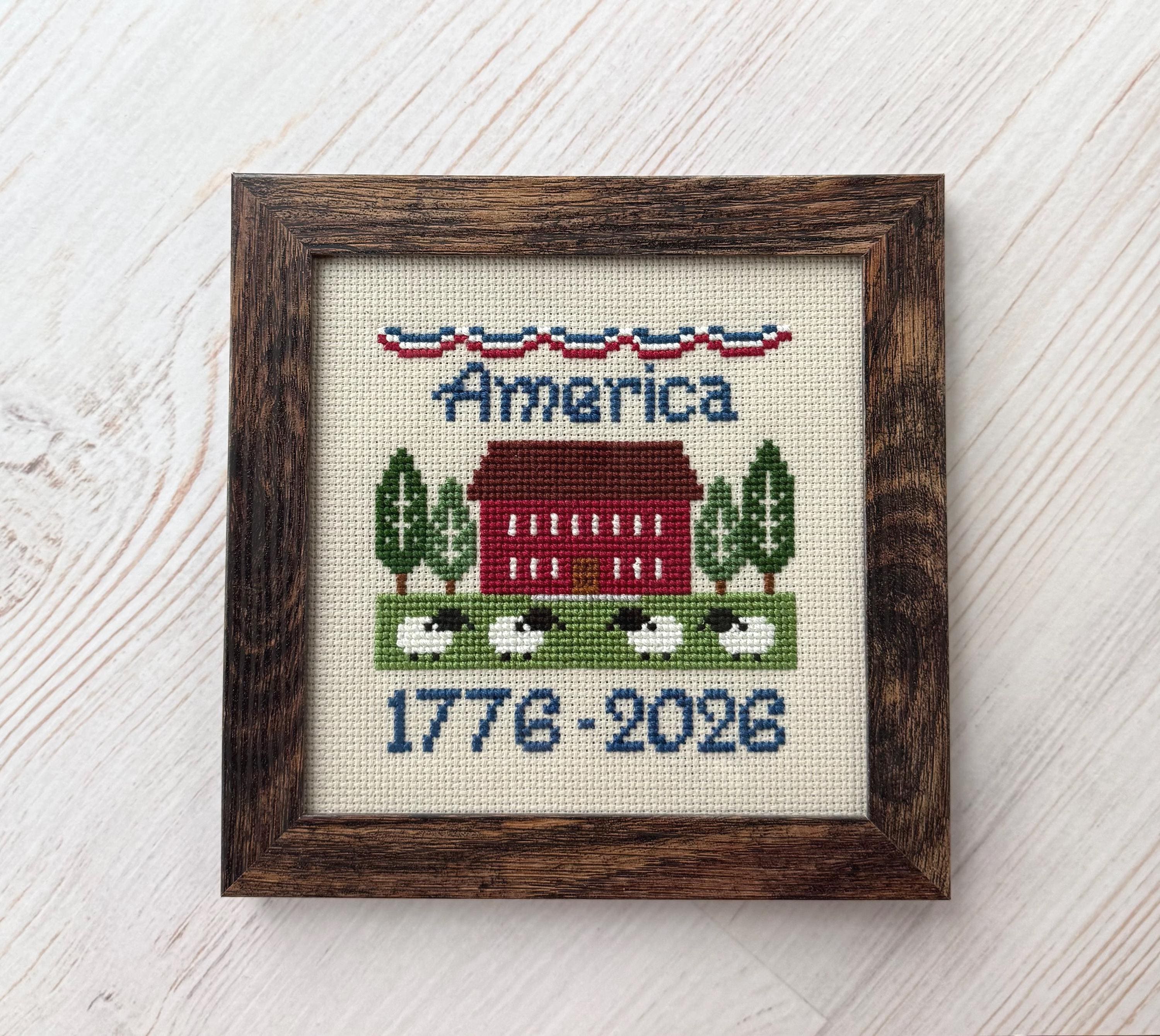 Hand-stitched America cross-stitch — banner detail